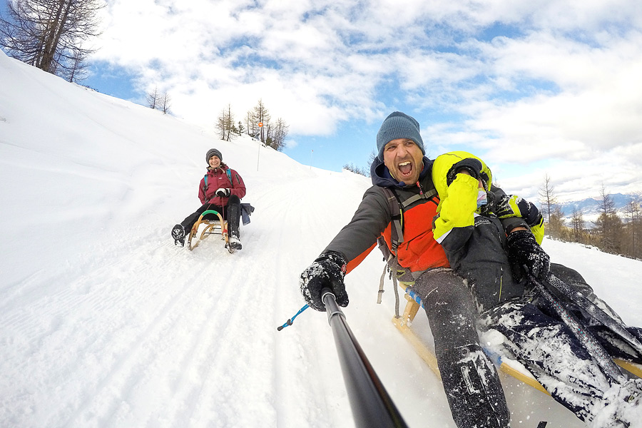 Family Trips Wordwide: sledding from a panoramic mountain chain in Austria